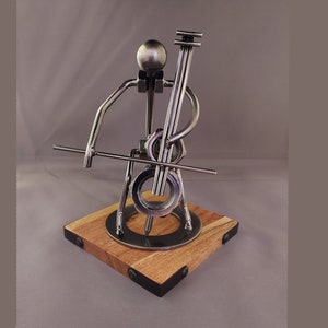 Figurine de joueur de violoncelle - Statue