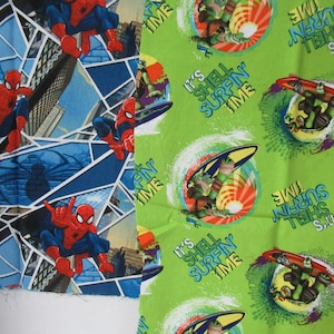 Ninja Turtles and Spiderman 2 pieces of cotton fabric spiderman is 12 inches by43 inches and Turtles is 13 by 27 inches perfect for masks.