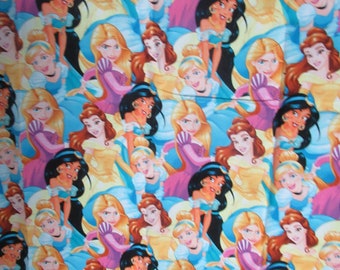 Disney multi princess packed that is a fat quater that is 18 inches by 22 inches wide and is 100% cotton and cute print.