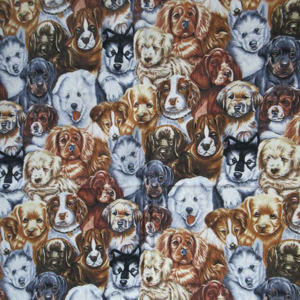 Robert Kaufmann Whiskers and Tails lots of  different dogs allover cotton fabric has 34 by 42 inches that has darling dogs.