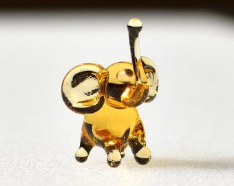 Tiny Lampwork Glass Elephant Miniature: Whimsical Collectible Figurine