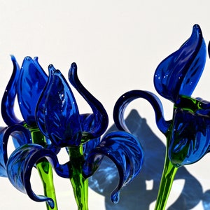 Beautiful extra long blue glass Iris flower. Excellent addition to your decor collection, unique gift. Each flower is priced individually.