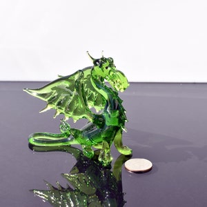 Gorgeous Glass Green Dragon. Detailed figurine with a lot of personality. Excellent addition to your glass menagerie collection.