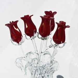 Beautiful long stem red-clear glass Rose flower. Excellent addition to your glass collection. Each flower is priced individually.