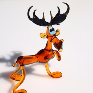 Cute Glass colorful Moose. Detailed figurine with a lot of character and personality.  Excellent addition to you glass menagerie collection