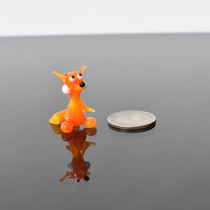 Cute Glass red orange fox. Whimsical figurine with a lot of character and personality. Excellent addition to your collection, unique gift