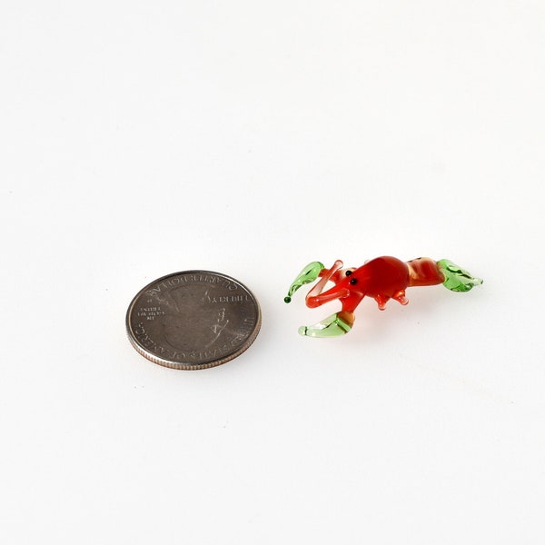 Cute Glass miniature red lobster. Whimsical figurine with a lot of details. Excellent addition to you glass menagerie collection