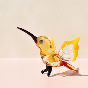 Beautiful Glass colorful hummingbird. Detailed figurine with a lot of character and personality. Excellent addition to your  collection