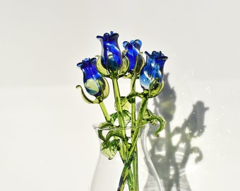 Beautiful blue glass rose flower. Excellent addition to your glass collection, unique gift. Each flower is priced individually.