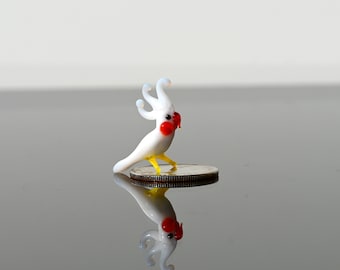 Cute miniature Glass cockatiel parrot. Whimsical figurine with a lot of character and personality. Unique gift.