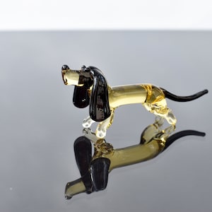 Cute Glass Dachshund. Whimsical figurine; lot of character and personality. Excellent addition to your glass collection, unique gift