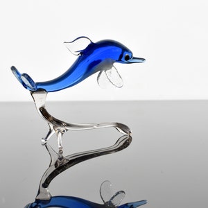 Cute Glass Dolphin. Whimsical figurine with a lot of character and personality. Excellent addition to your glass collection, unique gift.
