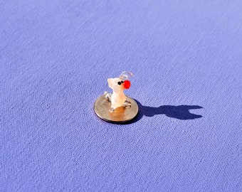 Cute tiny glass pig. Whimsical figurine with a lot of character and personality. Excellent addition to your glass collection, unique gift.
