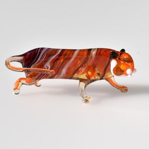 Orange Glass Tiger. Mean lookin figurine with a lot of character and personality. Excellent addition to your glass collection, unique gift.