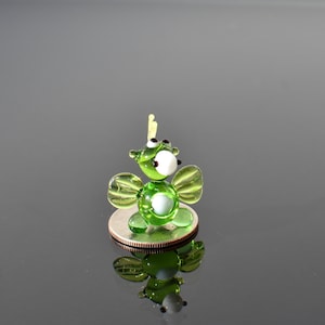 Cute tiny glass dragon. Whimsical figurine, lots of character and personality. Excellent addition to your glass collection, unique gift