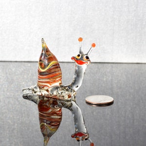 Cute Glass Snail. Detailed figurine with a lot of personality. Excellent addition to your glass menagerie collection.