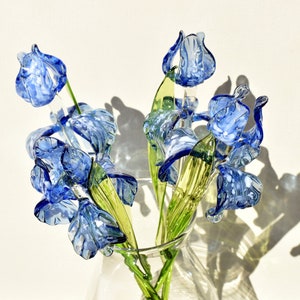 Beautiful Long stem light- blue with beige tone speckles glass Iris. Unique gift. Each flower is priced individually.