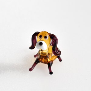 Cute Tiny Glass dog. Whimsical figurine with a lot of character and personality. Excellent addition to your glass collection, unique gift.