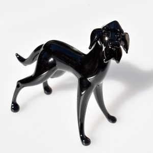 Glass Great Dane statue. Detailed figurine with a lot of character and personality.  Excellent addition to you glass menagerie collection