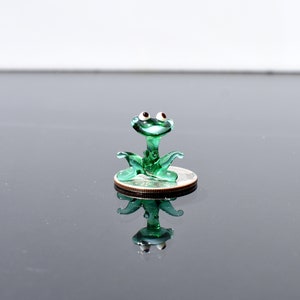 Frog miniature, with a lot of character and personality. Excellent addition to you glass menagerie collection.