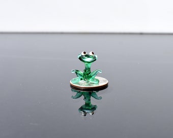 Frog miniature, with a lot of character and personality. Excellent addition to you glass menagerie collection.