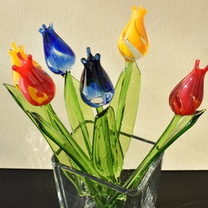 Beautiful bouquet of 6 colorful glass tulips.  Excellent addition to your home décor.