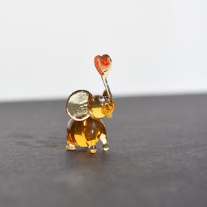 Cute glass tiny elephant with heart, whimsical, Lamp work miniature character from Glass Menagerie, Unique gift.