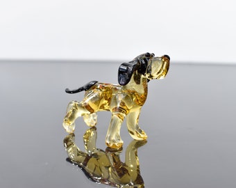 Realistically looking glass dog. Whimsical figurine; lot of character and personality. Excellent addition to your glass collection.