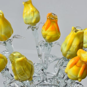 Beautiful long stem yellow-clear glass Rose flower. Excellent addition to your glass collection. Each flower is priced individually.