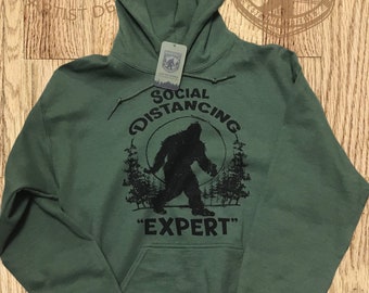 Bigfoot Search Gear Original Brand Artist Designed Social Distancing Heavyweight Hoodie