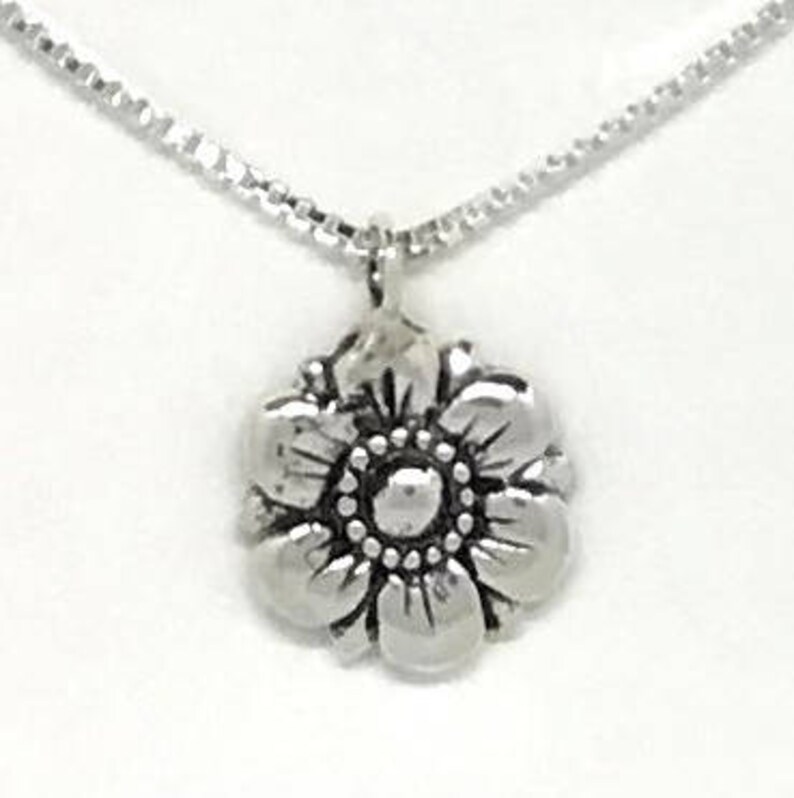 on 18 chain Sterling silver Flower Pendant