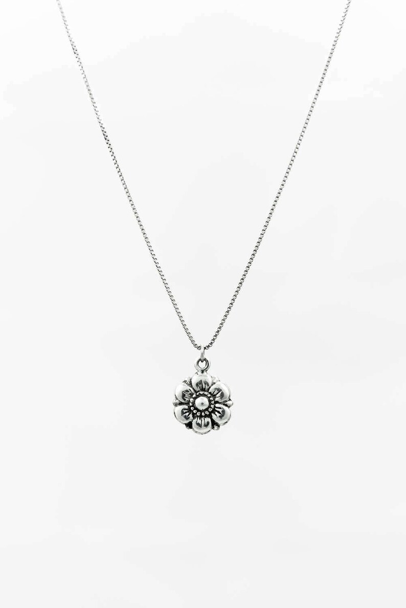 on 18 chain Sterling silver Flower Pendant