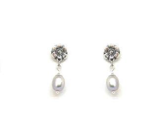 Pearl drop earrings with sterling silver flower ear top