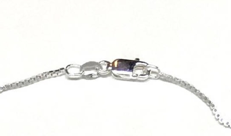 on 18 chain Sterling silver Flower Pendant