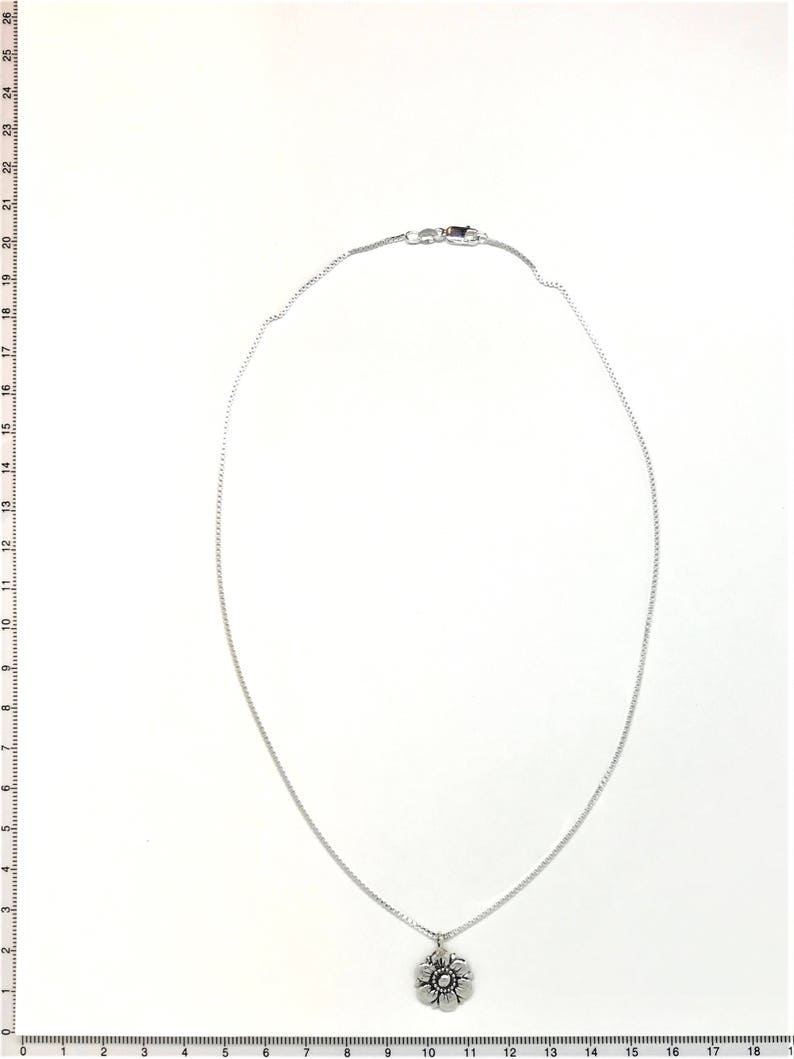 on 18 chain Sterling silver Flower Pendant