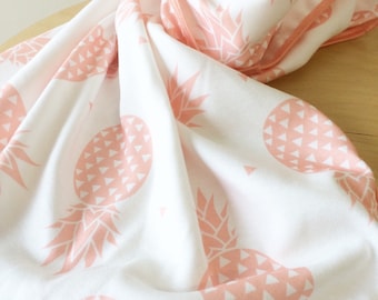 Pink pineapples organic baby blanket.