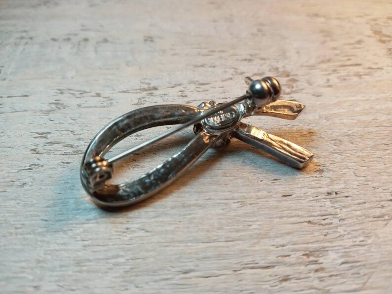 Vintage SP W LIND Signed Silver Plated Ribbon and Flower with Clear Crystal Rhinestones Pin Brooch