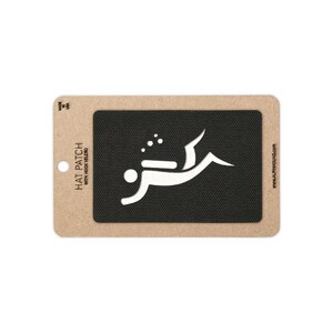 May include: A rectangular black hook-and-loop hat patch featuring a white graphic of a scuba diver. The patch is mounted on a tan cardboard backing card with the text HAT PATCH WITH HOOK VELCRO, MADE IN USA, and WWW.ALPHAHOUND.COM printed on it.