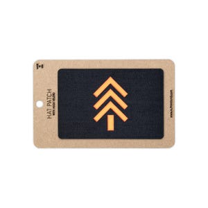 May include: A rectangular black hat patch with a hook velcro backing, featuring an orange geometric tree icon. The patch is mounted on a tan cardboard display card printed with the text HAT PATCH WITH HOOK VELCRO, MADE IN USA, and ALPHAHOUND.COM.