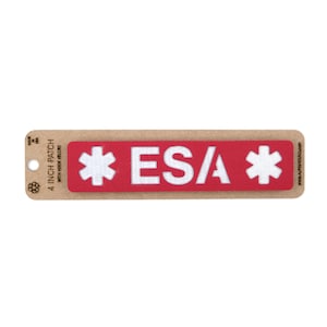 May include: A red 4-inch patch with white text that reads "ESA" and a white star on each side. The patch has hook and loop backing.