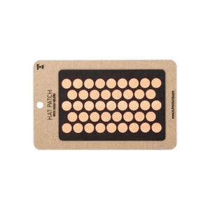 May include: A rectangular black hat patch with hook velcro backing, featuring a grid of light peach-colored circles. The patch is mounted on a tan cardboard display card labeled HAT PATCH WITH HOOK VELCRO, MADE IN USA, and ALPHAHOUND.COM.