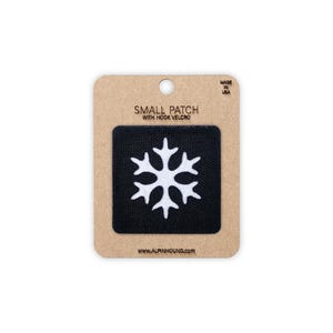 Petit écusson tactique flocon de neige noir et argent réfléchissant