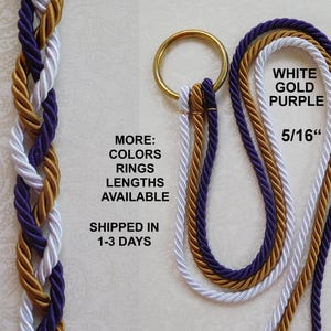 May include: A braided cord featuring white, gold, and purple twisted ropes attached to a gold-toned metal ring. The text on the image reads WHITE GOLD PURPLE 5/16" and MORE: COLORS RINGS LENGTHS AVAILABLE. The cord is 5/16 inches in diameter.