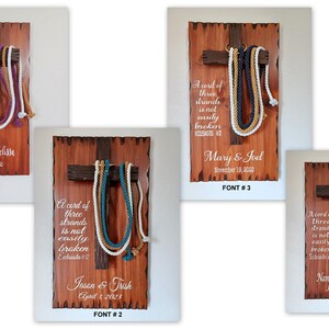 Peut inclure: Quatre plaques murales rectangulaires en bois, chacune dot&eacute;e d'une croix en bois brun fonc&eacute; avec trois cordes tress&eacute;es de diff&eacute;rentes couleurs suspendues. Chaque plaque affiche le texte A cord of three strands is not easily broken Ecclesiastes 4:12.
