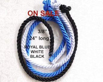 May include: Three twisted ropes in royal blue, white, and black, each knotted at the top. The ropes measure 3/8 inch in diameter and 24 inches in length. The text ON SALE, 3/8", 24" long, ROYAL BLUE, WHITE, and BLACK is printed on the image.