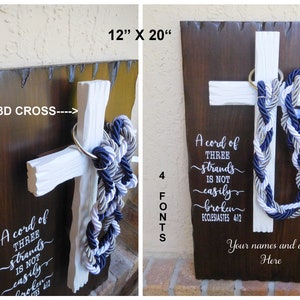 May include: A 12" x 20" dark brown wooden plaque featuring a white 3D cross with a braided navy, grey, and white rope. The text reads: A cord of THREE strands is NOT easily broken ECCLESIASTES 4:12 and Your names and date Here.
