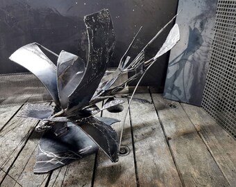 Unique welded iron sculpture beautiful space effects Star bird following the energy trail or her half signed O KLOSKA