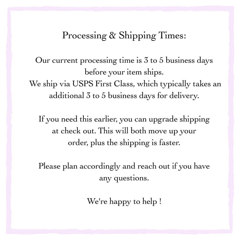 May include: A white rectangular sign with a light purple border. The text reads "Processing & Shipping Times:" followed by details about processing and shipping via USPS First Class. It also mentions upgrading shipping.