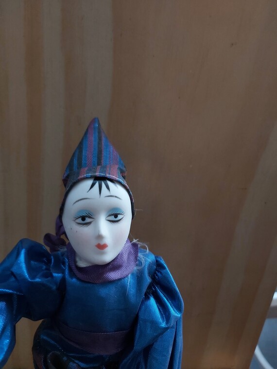 porcelain mime doll