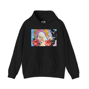 Kali Uchis* Unisex Heavy Blend™ Hooded Sweatshirt